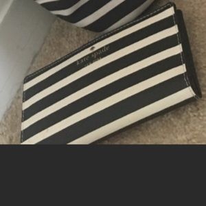 Kate spade wallet! Tags and booklet comes with it.